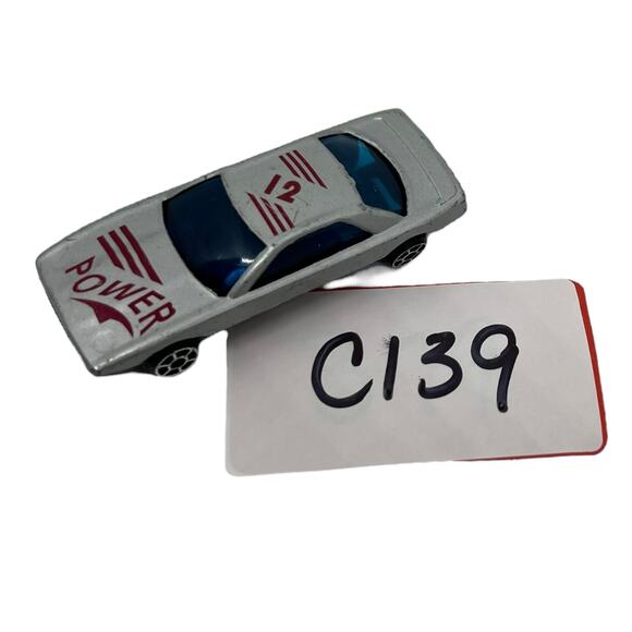 Silver Diecast Toy Car with "Power" Graphics & Blue Windows 1:64 - Picture 7 of 7